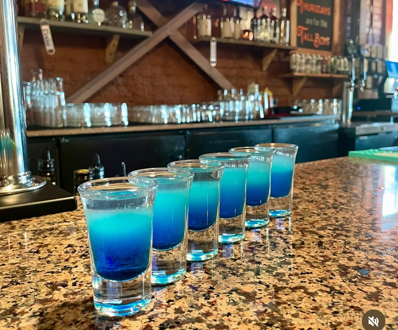 Blue layered shots on the bar