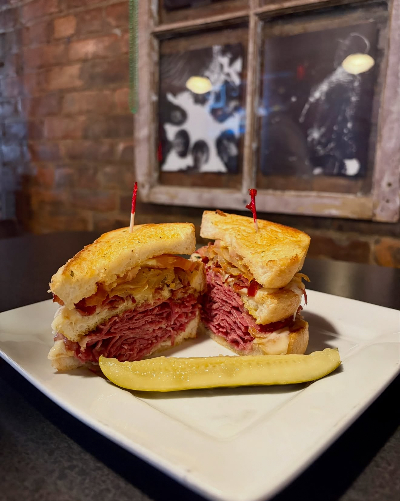 Pastrami sandwich with a pickle