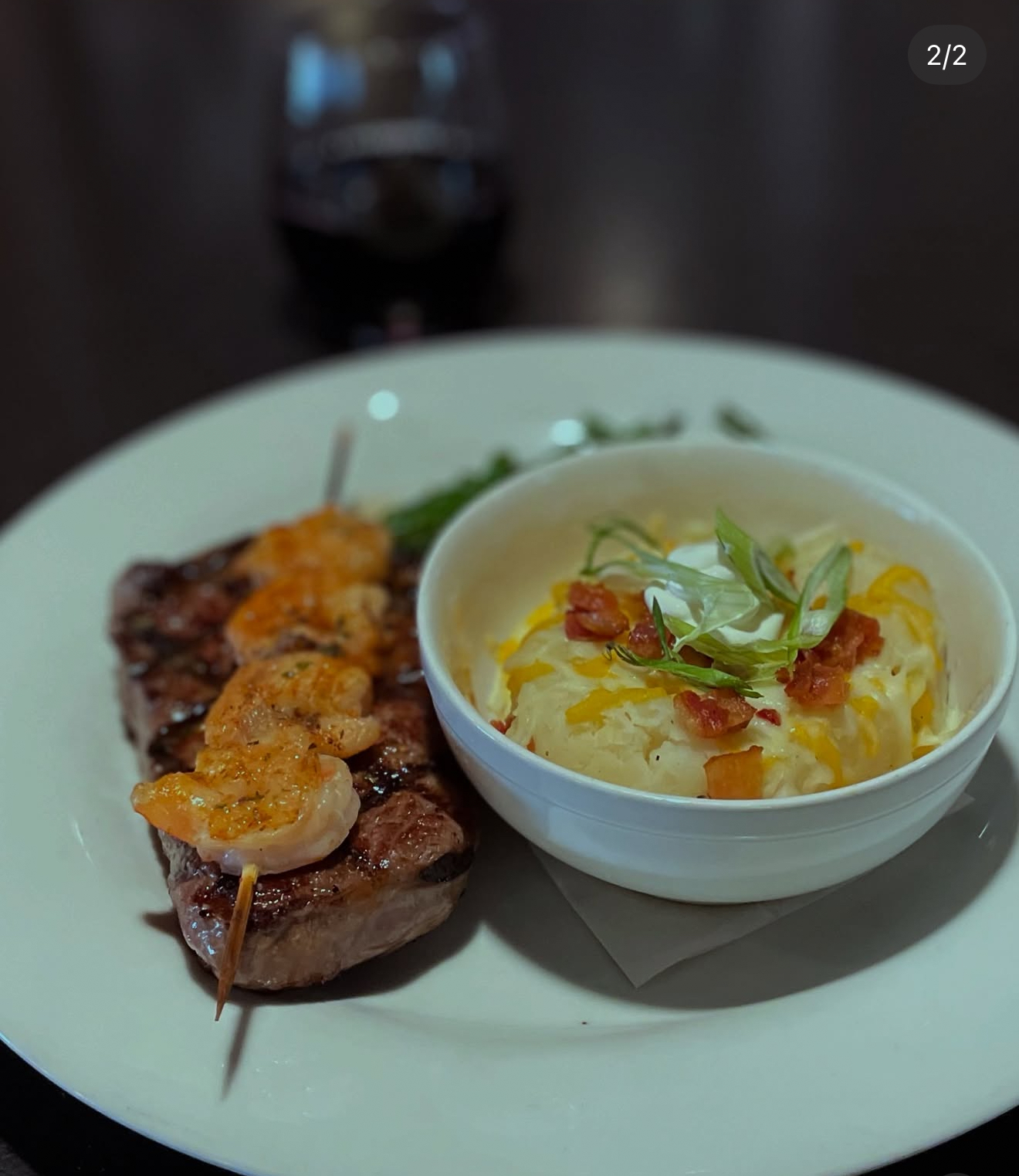 Steak with shrimp and loaded mashed potatoes